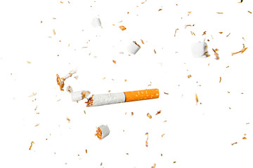 Broken cigarette fly in air on isolated background. Conception of combating smoking