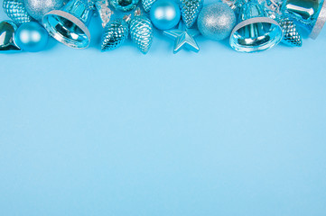Close-up of Christmas decorations on the blue background