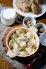 Boiled dumplings. Traditional meat dish of Russian cuisine
