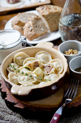 Boiled dumplings. Traditional meat dish of Russian cuisine