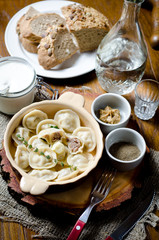 Boiled dumplings. Traditional meat dish of Russian cuisine