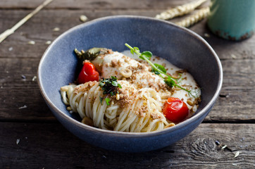 Pasta with eggplant, hazelnuts, pine nuts and cream sauce