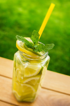 minth lemonade in jar garden background