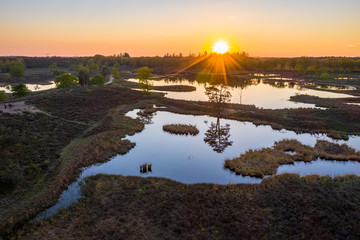 Aerial sunset photo of Hatertse Vennen nature reserve. Located in Heumen, Wijchen, Overasselt,...