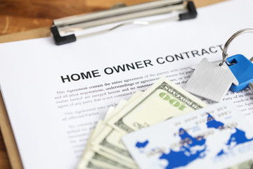 Filling out document that says home owner contract