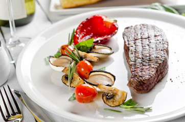 Beef steak with vegetables and mustard sauce