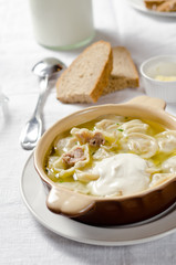 Dumplings in meat broth. Traditional meat dish of Russian cuisine