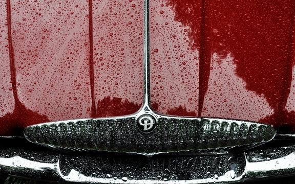 LONDON, UK - CIRCA SEPTEMBER 2011: Daimler overhead shot of radiator grill and bonnet. Raindrops on the bodywork.