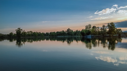 Fototapeta na wymiar Sunrise with a lake in the foreground