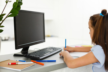 Little Girl Using Computer Concept, distance online learning