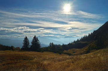 Naklejka na ściany i meble mountain view in Bavarian alps with peaceful autumn sky
