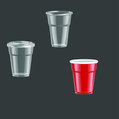 
Set of empty plastic glasses on a gray background