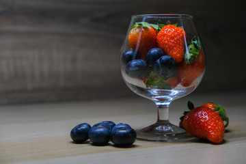 Strawberry and blueberryy in the glass