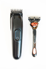 black electric hair clipper and shaving blade machines