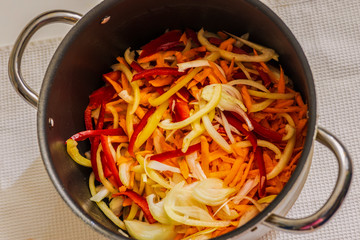 various freshly cut vegetables in a pot