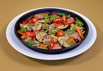 Greek eggplant with veal on a blue 