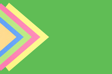 Colored triangles on a green background.