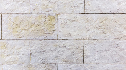 Grey textured stone surface.