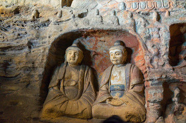 Buddha statue in Yungang stone cave. datong, Shanxi province, China	