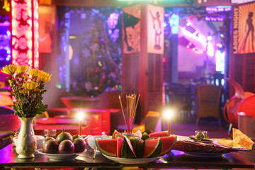 offering to the gods in a bar in Hoi An