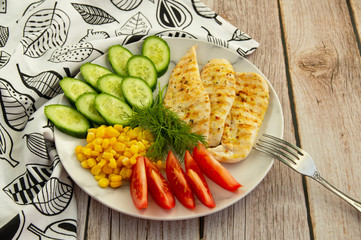 Grilled chicken fillet with vegetables and dill