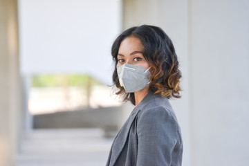 Coronavirus patient coughing and wearing a medical mask to protect from the virus and bacteria While being outdoors and in community.Covid-19 Virus Protection concept.