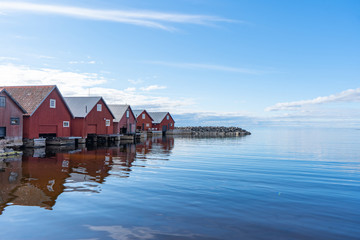 Fototapeta premium Fishing village on the Baltic coast. View from the bay. Scandinavian landscape. Swedish coast.