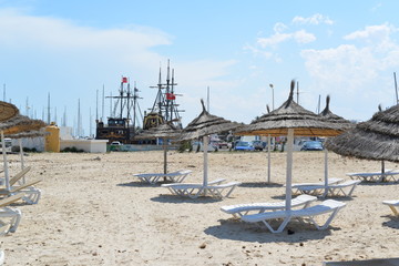 Fototapeta na wymiar empty beach with many umbrella in Turkey
