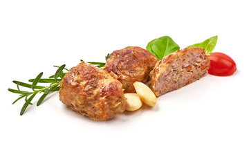 Homemade baked pork meatballs, isolated on white background