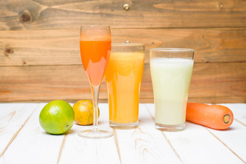 Healthy diet Fruits and vegetables juice ready to drink on wooden table