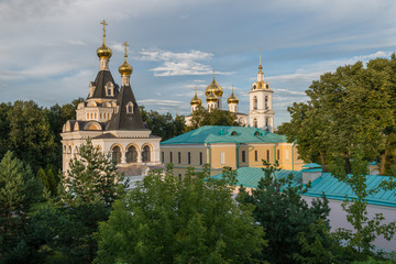 Fototapeta na wymiar Church of St. Elisabeth and Assumption Cathedral on Historical Square in summer, Dmitrov, Moscow Region, Russia