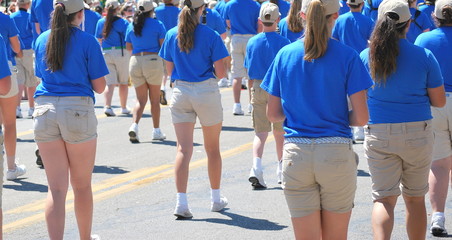 Obraz premium Marching band in a parade outdoors.