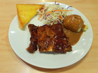 Portrait of Barbecued Pork Ribs with Mashed Potatoes