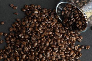 aromatic coffee beans in a wooden plate