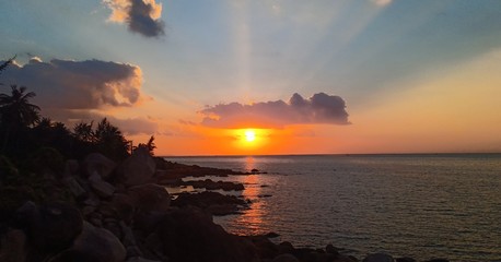 sunset over the sea on island