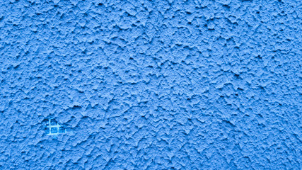 Fototapeta na wymiar Textured plaster a blue background in style grunge.