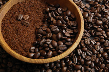 aromatic coffee beans in a wooden plate