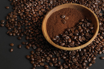 aromatic coffee beans in a wooden plate