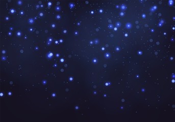 Blue bokeh light background. Sparkle effect with particles. Magic overlay dust. Glitter blur texture.