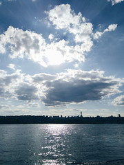 Sunny morning in clouds  in city landscape of river Dnipro