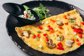 tasty baked omlette meal on plate