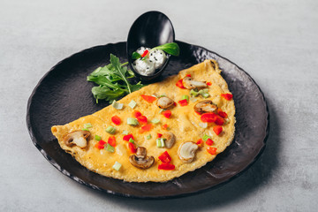 tasty baked omlette meal on plate