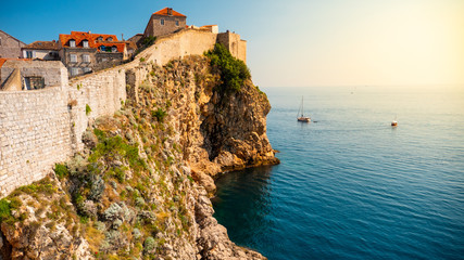 Fototapeta na wymiar Old town towering on a cliff above the sea in Croatia