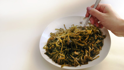 hands, delicious seaweed, or kelp