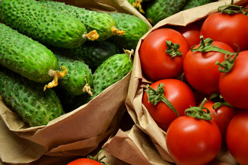 Fresh vegetables from farmers market. Cucumbers, tomatoes. Pickle cucumbers. Organic vegetables. Salad ingredients.