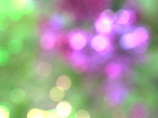 Fototapeta premium Abstract background with lighting bokeh effect in green and purple colors