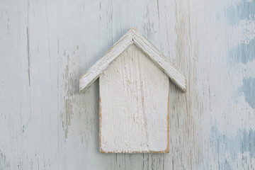 Simple White House On Wood Background