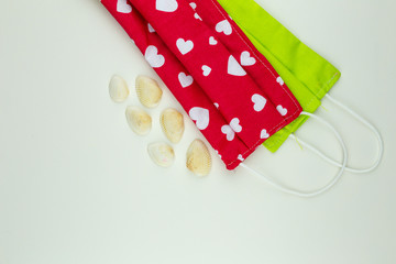 Two colorful COVID 19 masks with shells