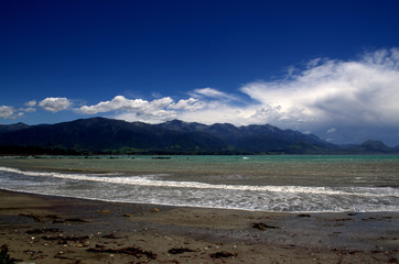 The beach at Kaikoura surrounded by mountains