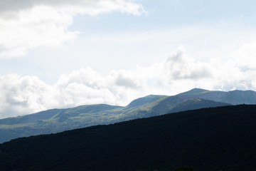 Mount Jura Alps France before the rain. Mountains in the fog.
